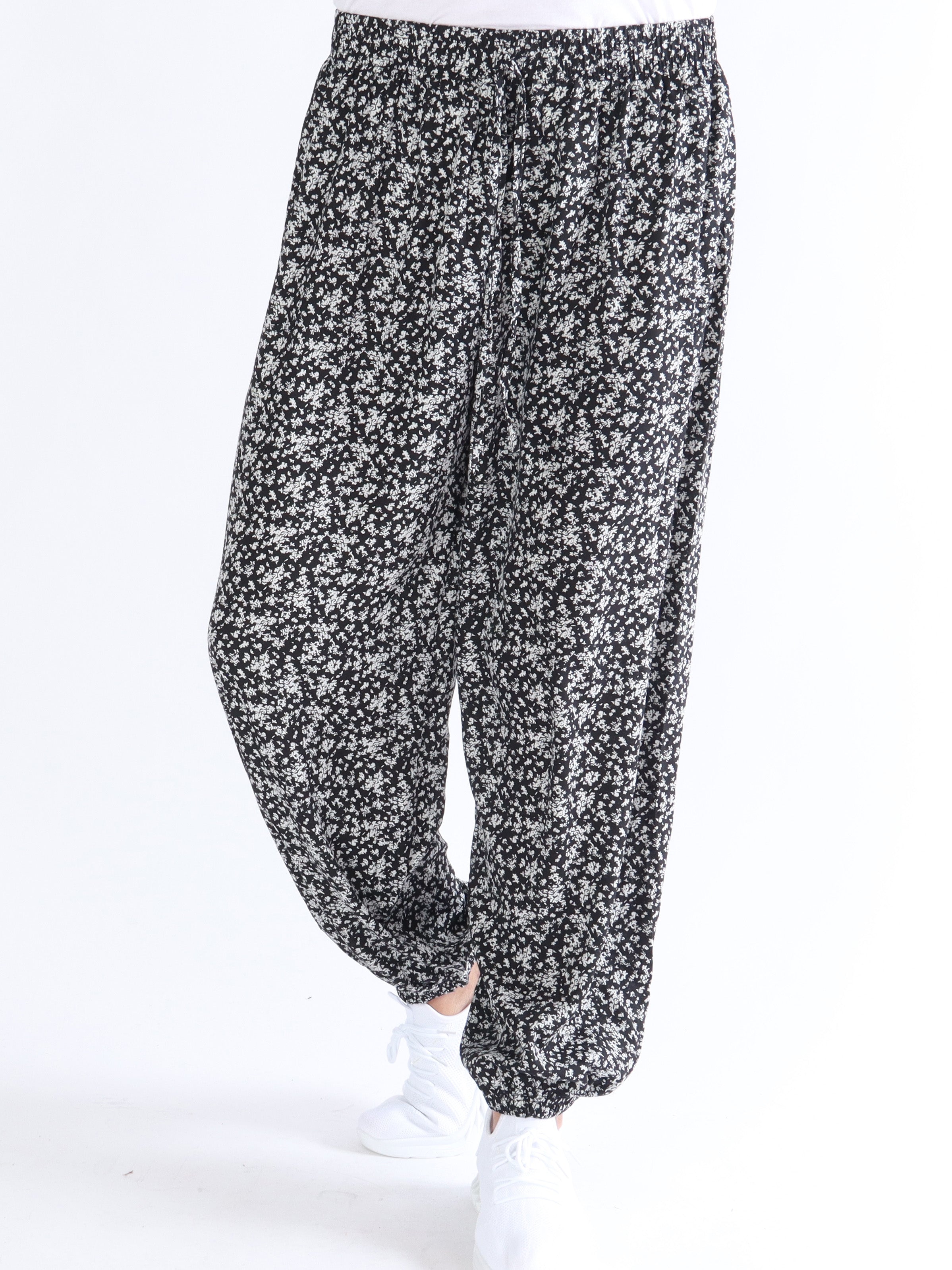 Roselin - Långa byxor med vitt blommönster